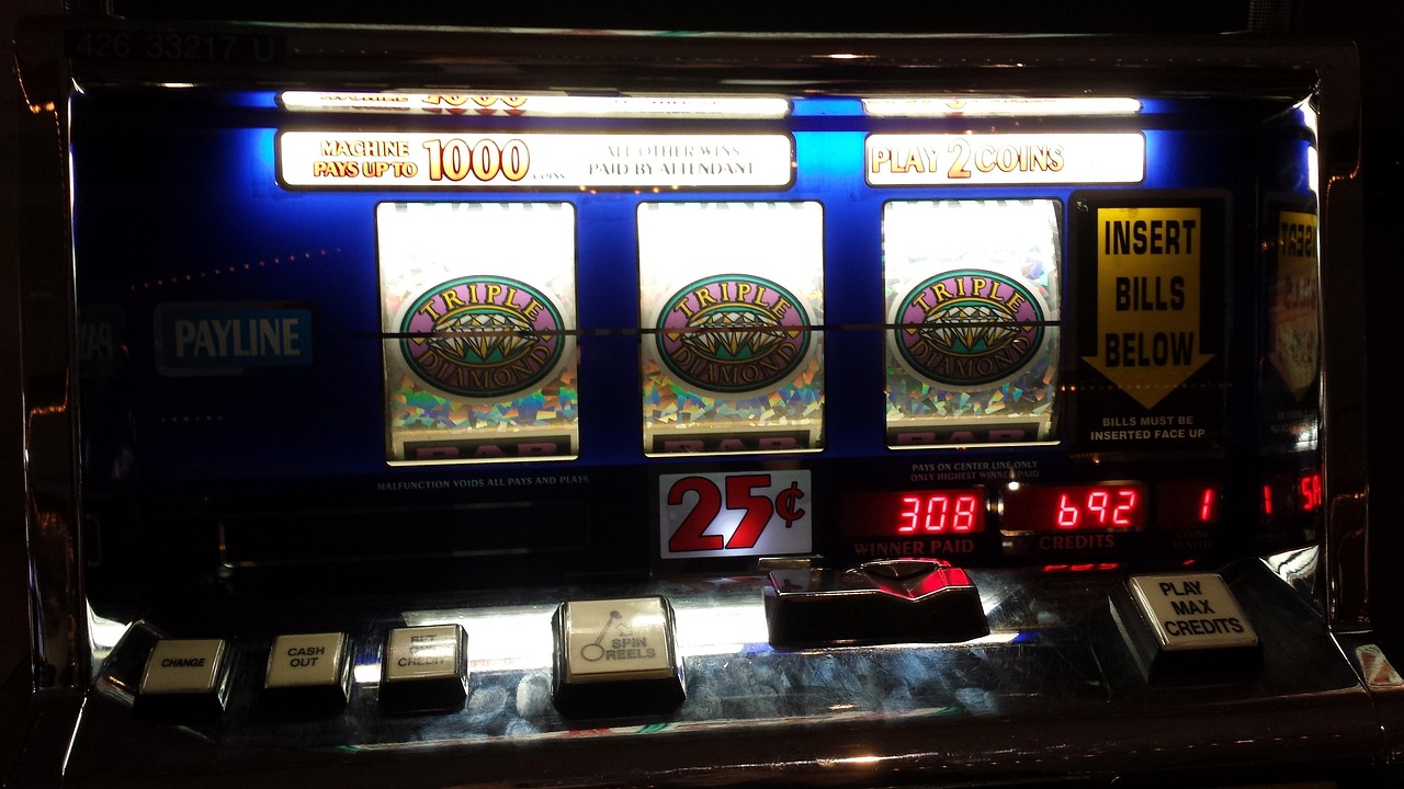 Slot machine reels with a jackpot symbol and golden coins