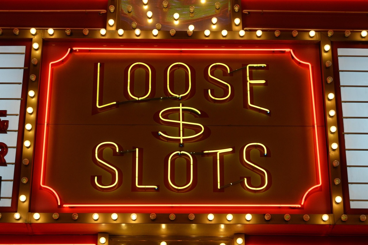 Las Vegas style slot machine with glowing jackpot lights